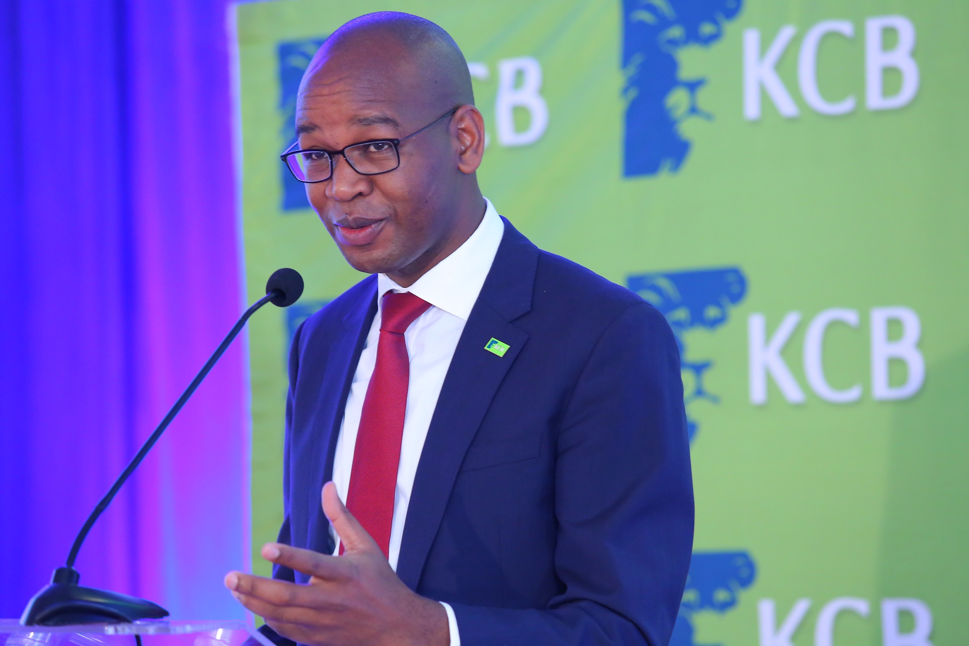KCB CEO Joshua oigara, the bank made 15.3 billion in profit in the first six months. it is also acquiring two banks in rwanda and tanzania 
