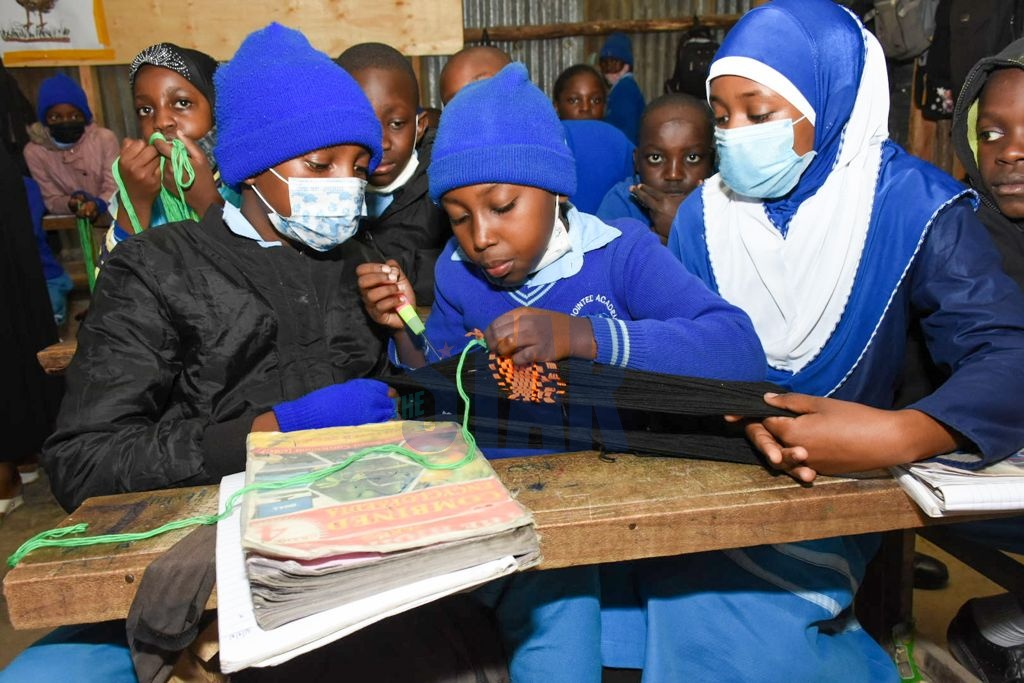 CBC Students during a practical lesson in one of the primary schools in the country. a working party has been constituted to reform the curriculum. 