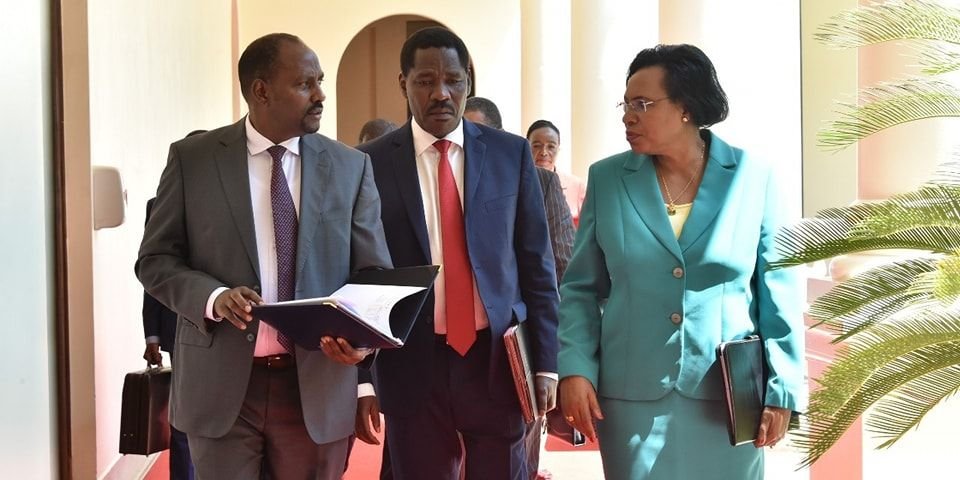 Outgoing Cabinet Secretaries Ukur Yatani Finance, Peter Munya Agriculture and Margaret Kobia Public Service during a recent cabinet meeting to approve use of Cotton GMO seeds.