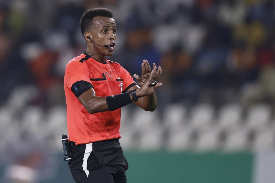 Somalian referee Omar Abdulkadir Artan gestures during the Africa Cup of Nations (CAN) 2024 group D football match between Mauritania and Algeria at Stade de la Paix in Bouake on January 23, 2024