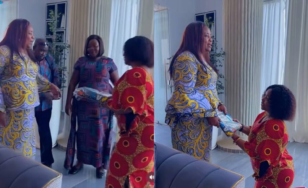 CHRISTINA SHUSHO KNEELS BEFORE MAMA IDA