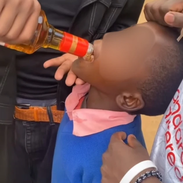 OUTRAGE AFTER VIDEO SHOWS ADULTS GIVING ALCOHOL TO SCHOOLBOYS